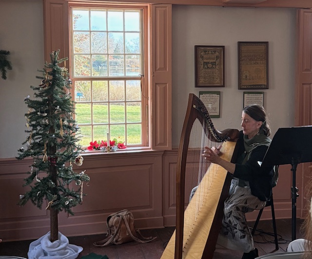 Mary playing the Harp