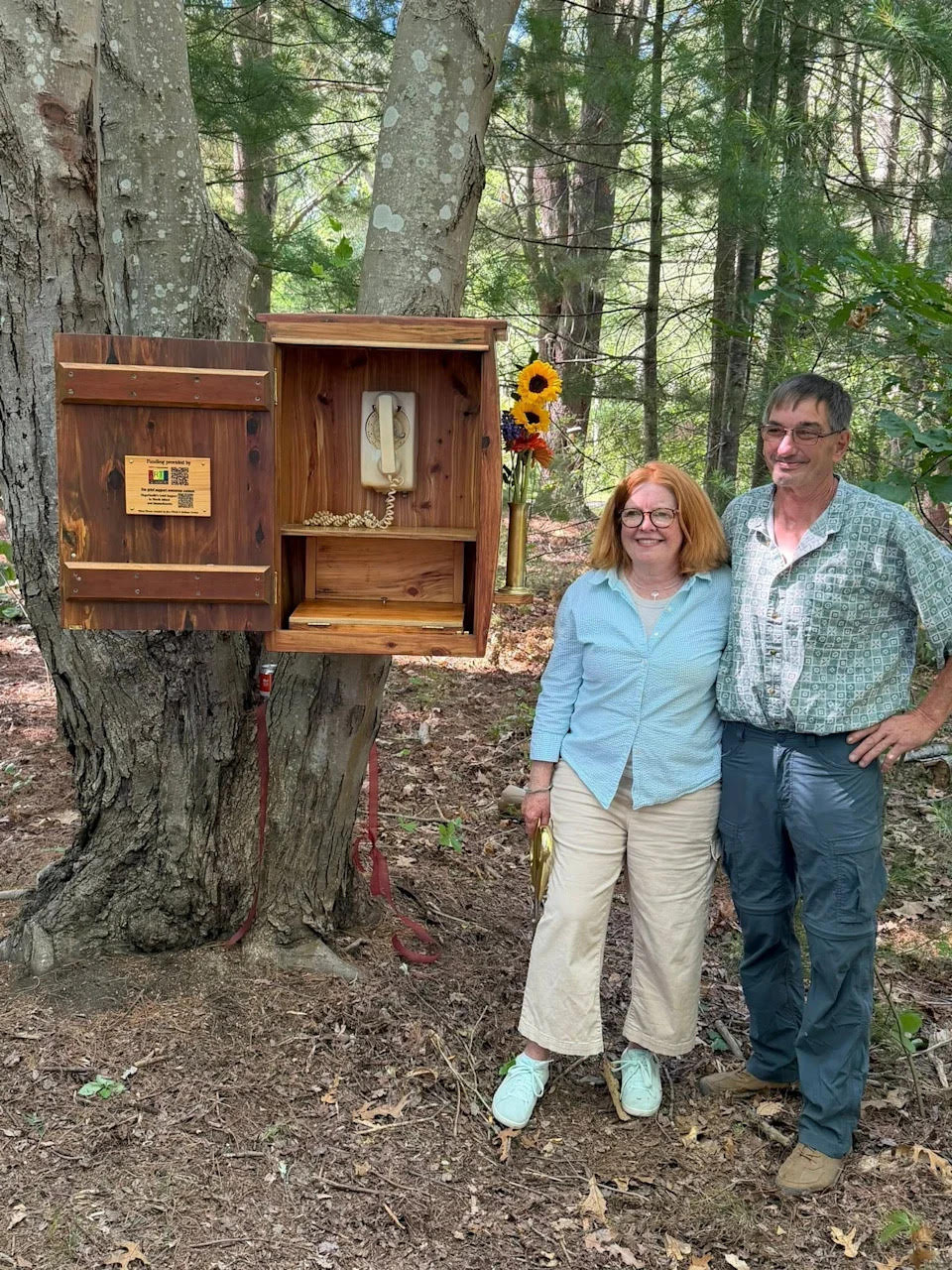 Melissa and Jim pose with the wind phon